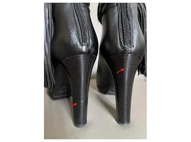 Autre Marque Botas o botines de cuero negro T. 37,5 con correa en el tobillo y un pompón. 