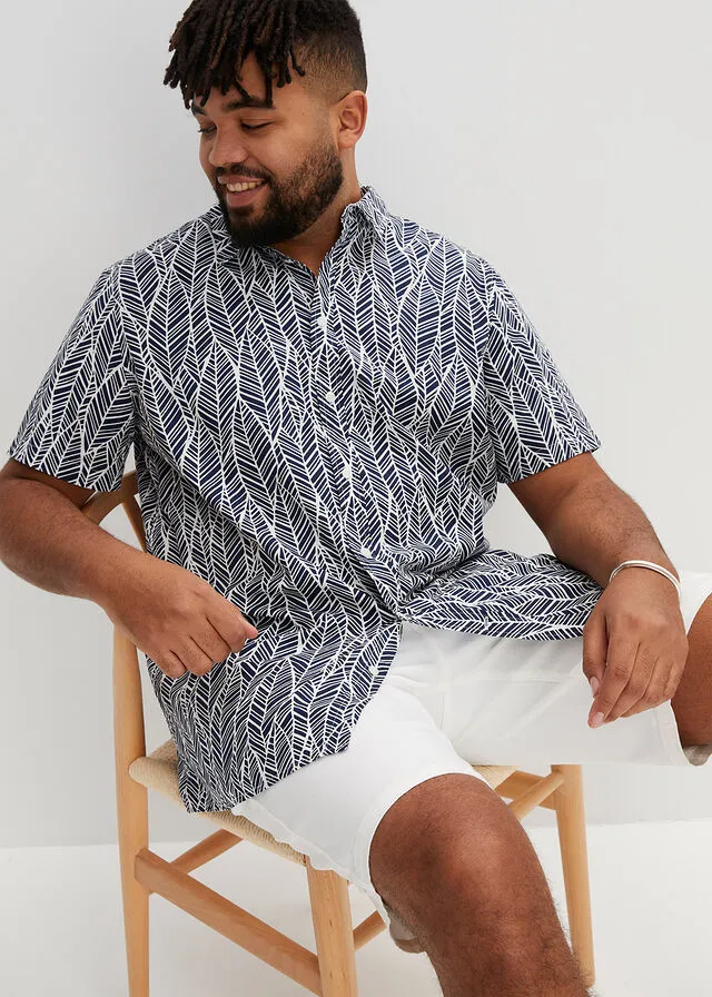 CAMISA DE MANGA CORTA AZUL OSCUROBLANCO DE FLORES