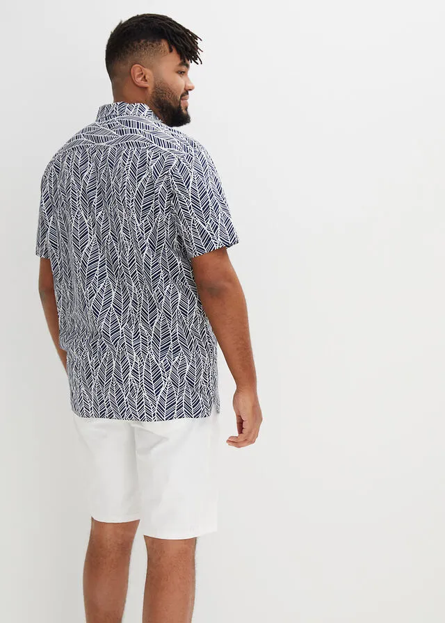 CAMISA DE MANGA CORTA AZUL OSCUROBLANCO DE FLORES