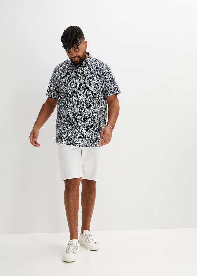 CAMISA DE MANGA CORTA AZUL OSCUROBLANCO DE FLORES