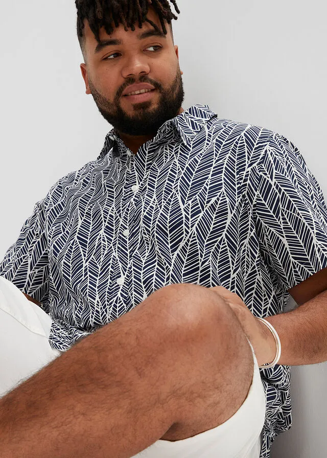 CAMISA DE MANGA CORTA AZUL OSCUROBLANCO DE FLORES