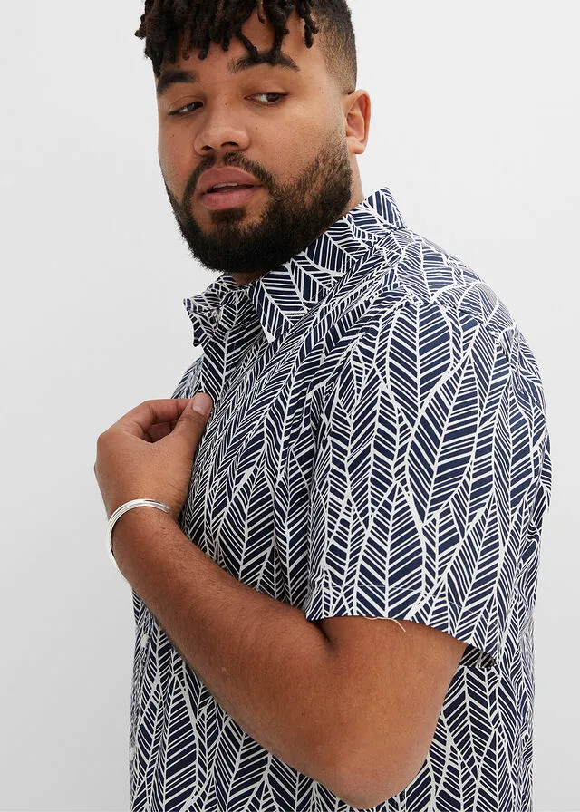 CAMISA DE MANGA CORTA AZUL OSCUROBLANCO DE FLORES