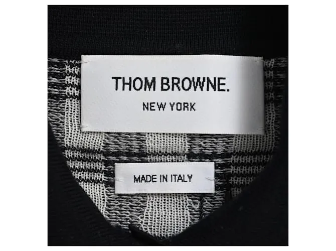 Camisa sin mangas con estampado a cuadros en lana merina negra de Thom Browne 