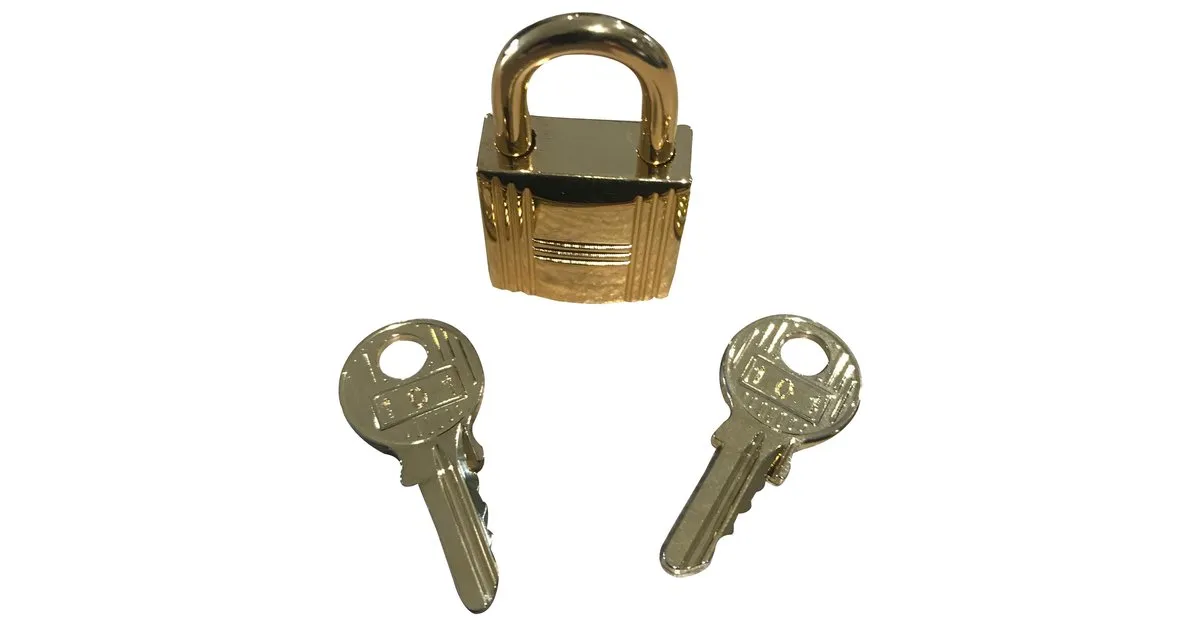 Candado de acero dorado Hermès con 2 llaves 
